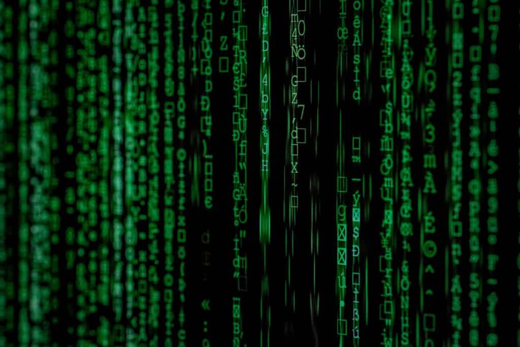 a screen with computer code projected on it