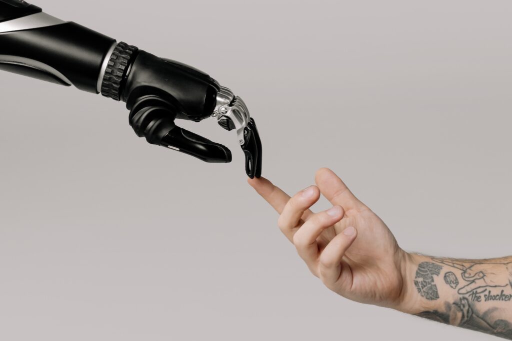 Decorative. A robot finger meets a human finger.
