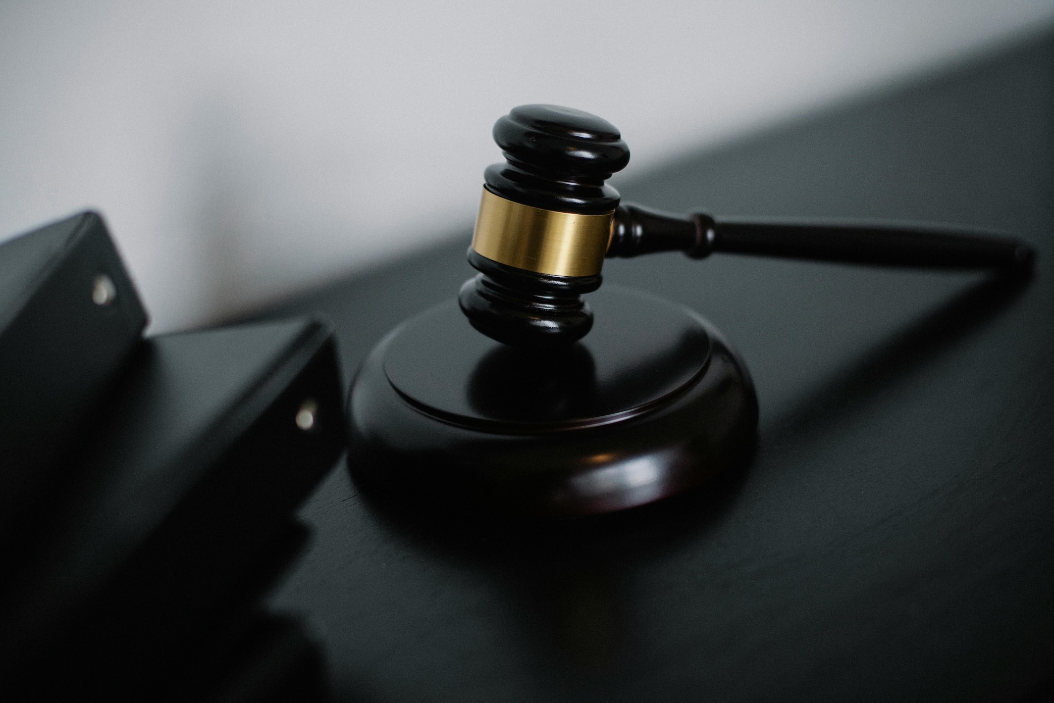 A black gavel from a law courtroom